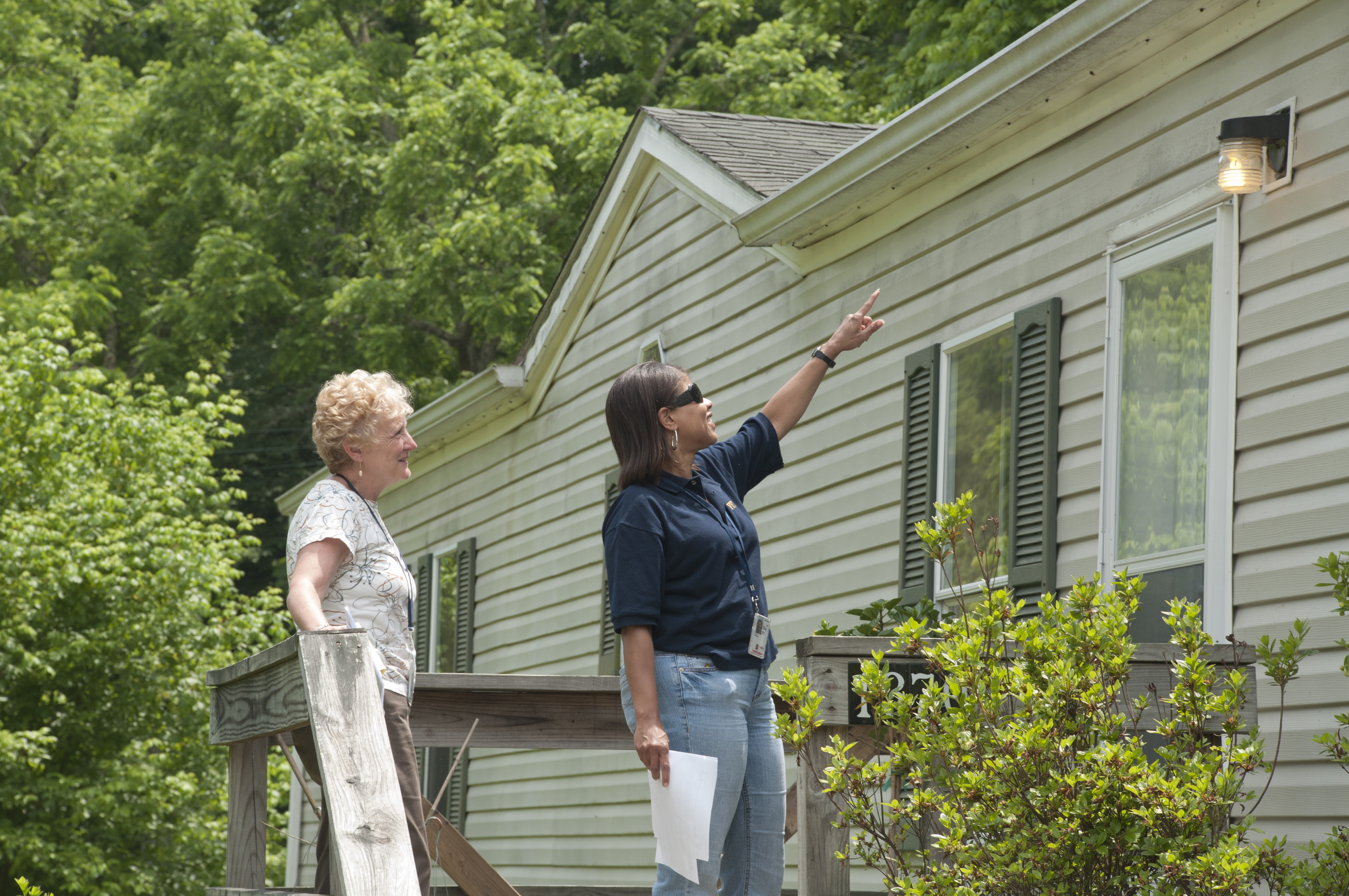 Home inspector examining a property during an energy efficiency review